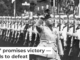 Hitler and Mussolini salute Nazi troops in 1937. Bettmann/Getty Images